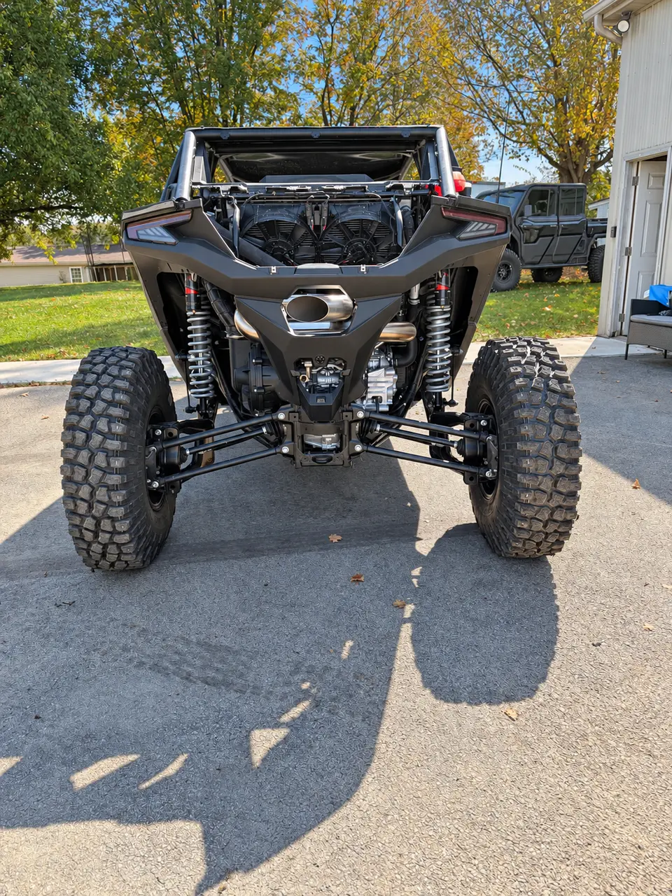 Make the rear view worth a second look. The installed JKBuilt RECOIL places its distinctive outlet at the center of the UTV’s wide, aggressive stance.